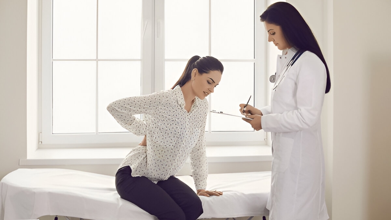 A chiropractor at Ridgefield Chiropractic & Wellness Center performs a Sciatica Treatment on a patient.